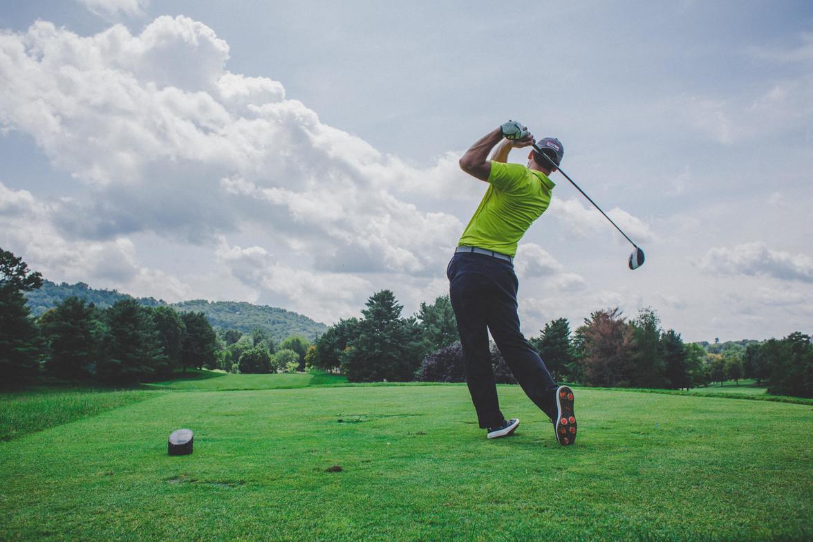 Golfer with low back pain after swinging club