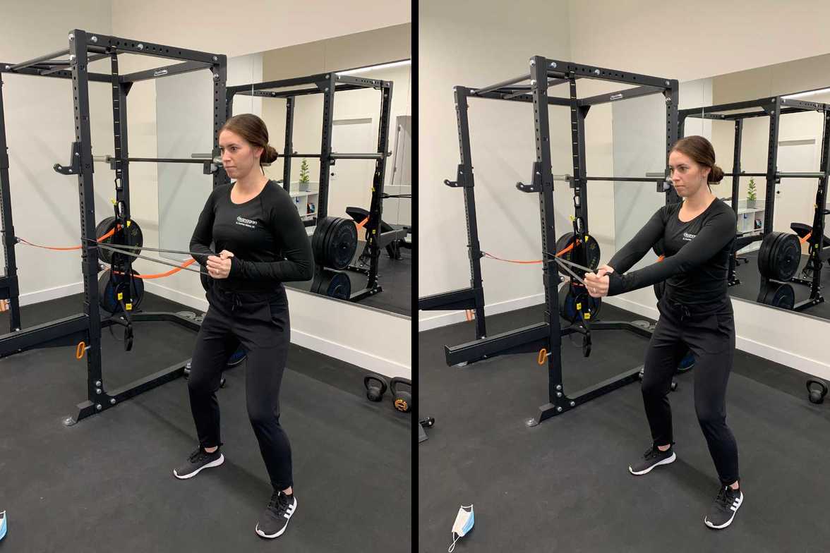 Chiropractor performing pallor press on a squat rack