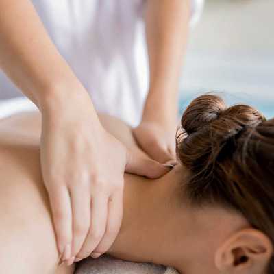 Massage Therapist performing massage in West Kelowna