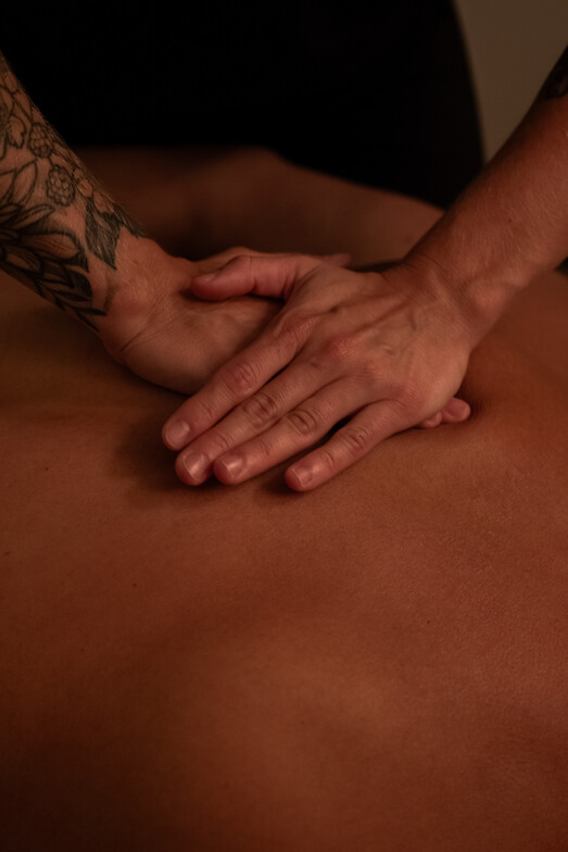 Massage therapist performing Swedish massage in West Kelowna
