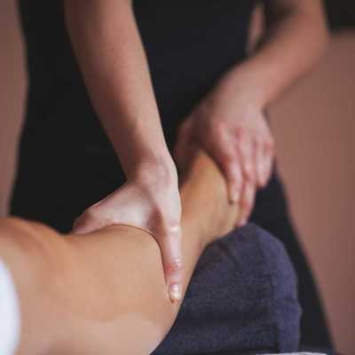 Massage therapy being performed on the leg